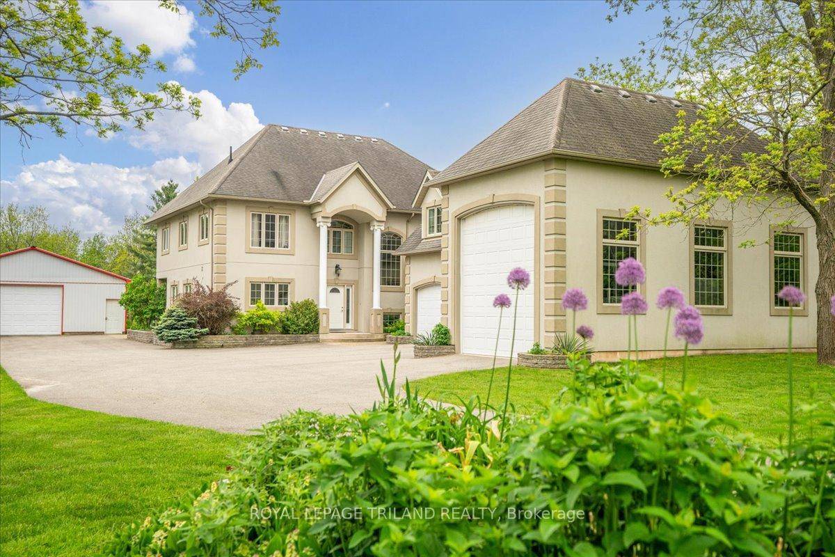 Discover exceptional living in this stunning custom built home featuring ICF Insulated Concrete Form construction for unmatched energy efficiency and durability, perfectly situated on 2 private acres in the desirable ...