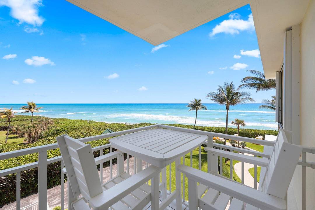 Experience elevated coastal living in this fully renovated northeast corner residence at the prestigious Brigadoon Condominium.