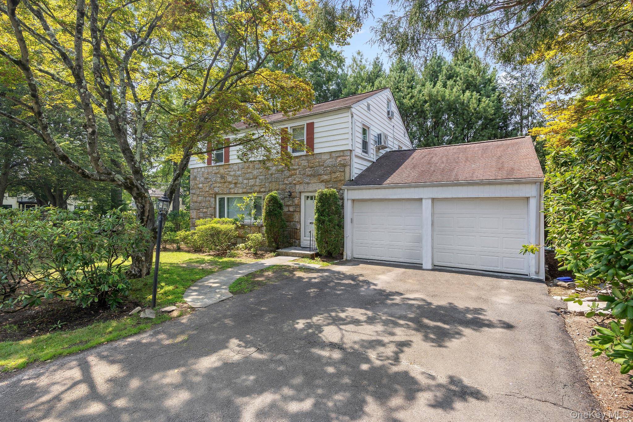 Situated in the sought after Highlands neighborhood of White Plains, this charming colonial home is nestled on a quiet, tree lined cul de sac.