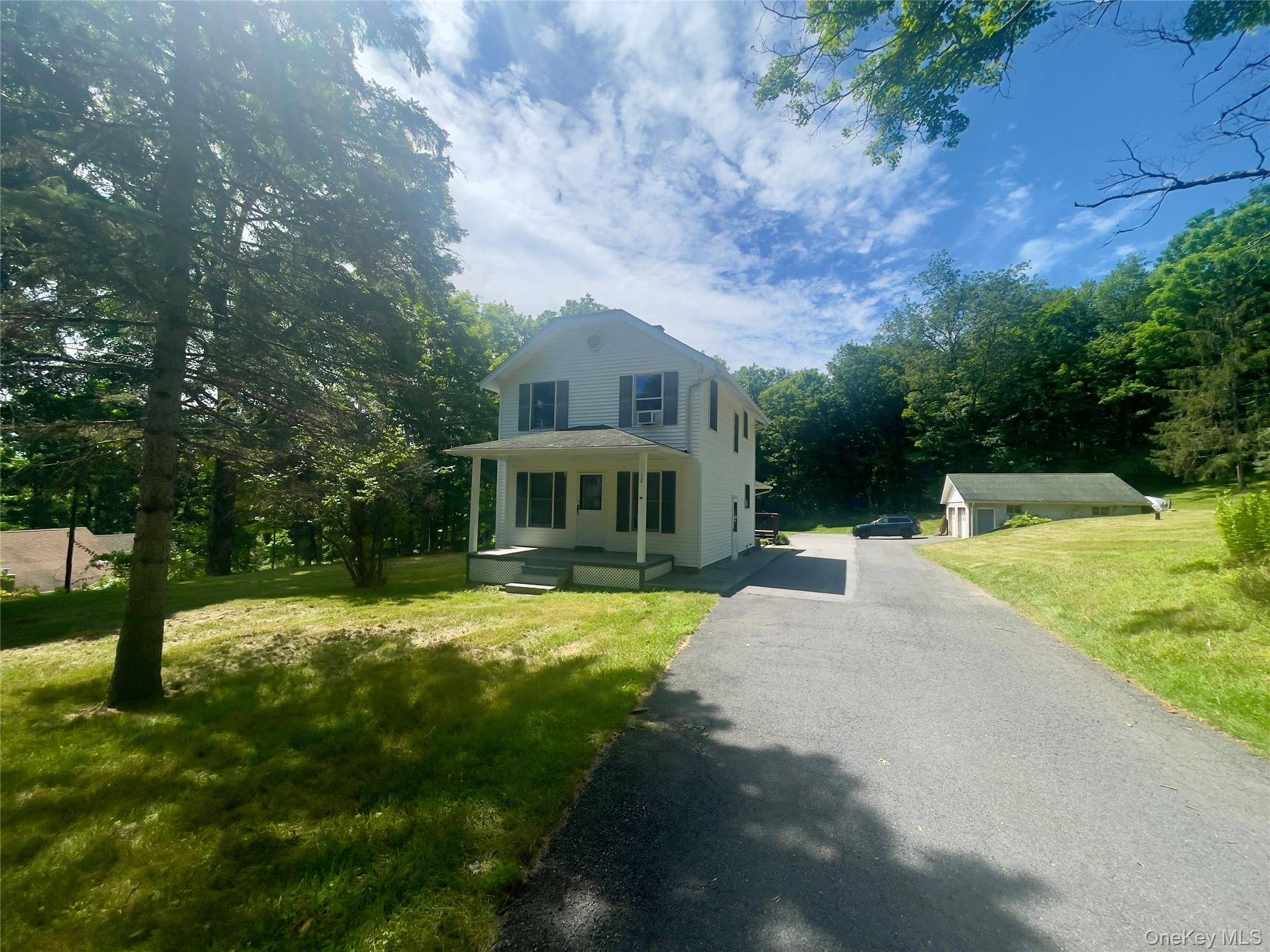 Enjoy the timeless appeal of a colonial layout with generous living spaces, perfect for entertaining or gatherings.