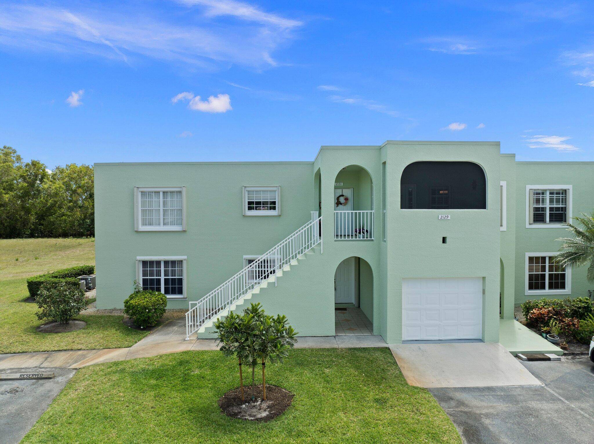 Welcome to this stunning meticulously maintained 2 2 condo boasting a spacious open floor plan that is both beautiful and functional.