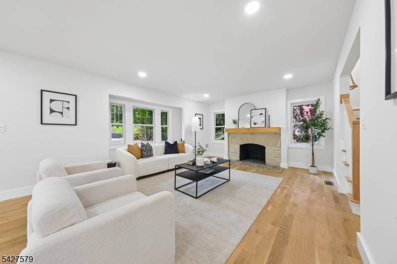 Experience a Modern Tudor Revival where classic architecture meets refined, contemporary design.