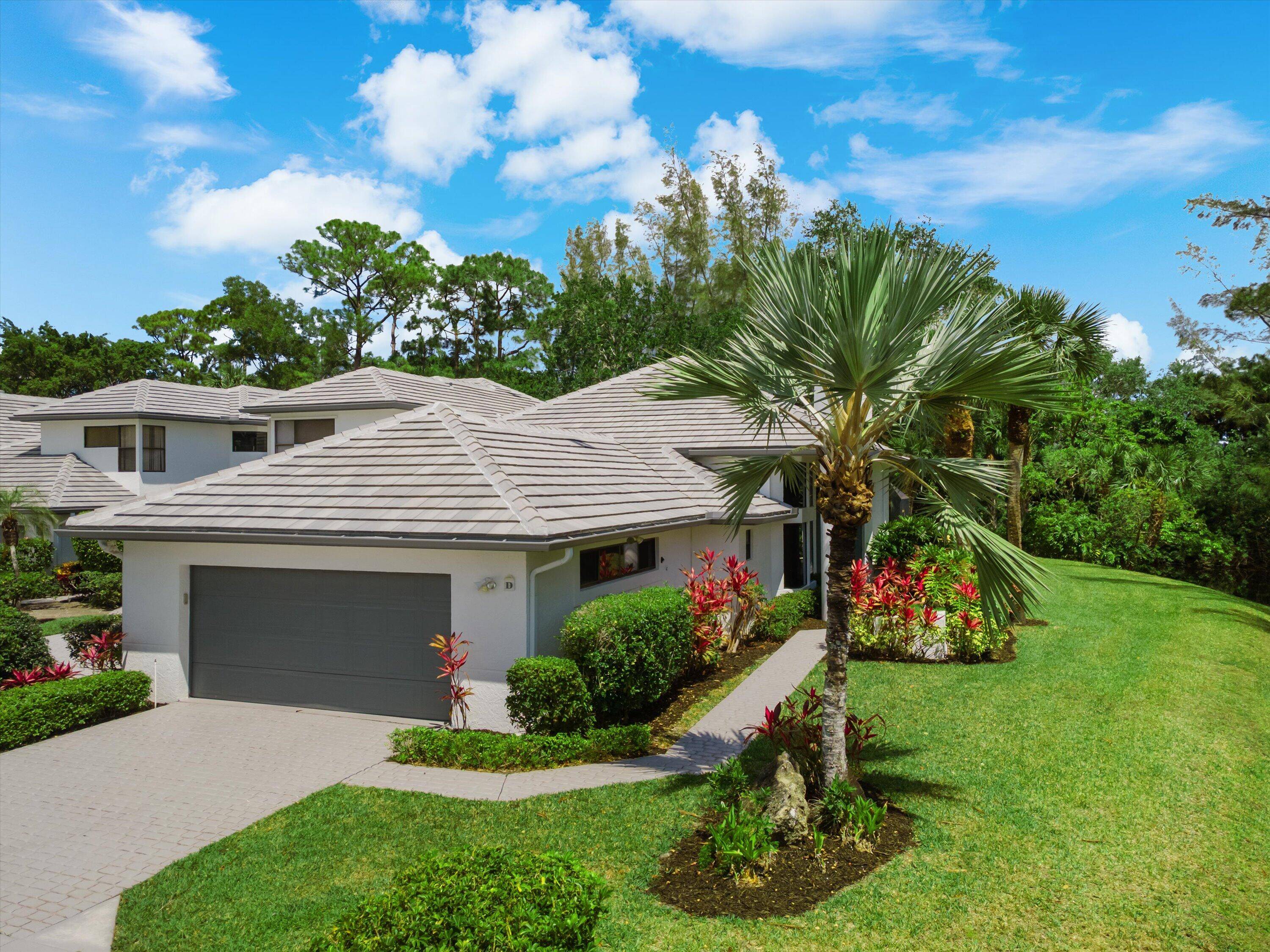 Located on a secluded corner lot surrounded by native Florida palms, oak trees and water, this private location is like no other !