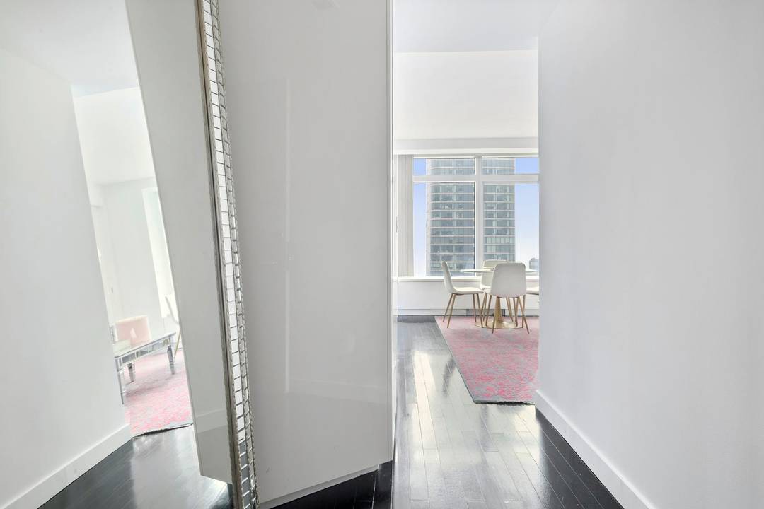 Views of Statue of Liberty, the river, city of Manhattan and beyond from every window of your residence.