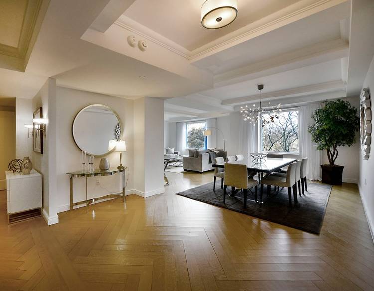 Gracious luxury living, beautiful Central Park views from living room and master bedroom and world class hotel services distinguish this mint condition, Costas Kondilys designed 3 bedroom, 3 bath apartment.
