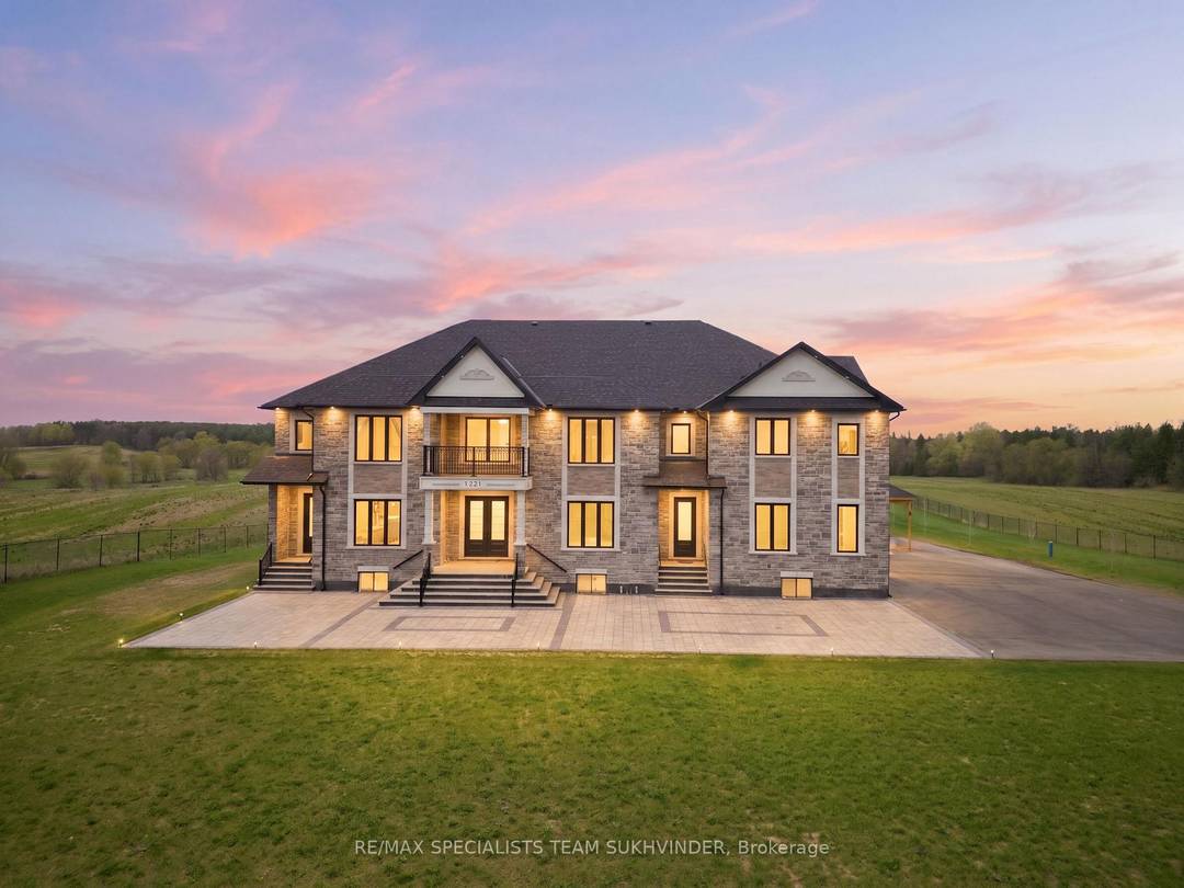 Welcome to a rare offering where luxury meets privacy, nestled on approximately 2.
