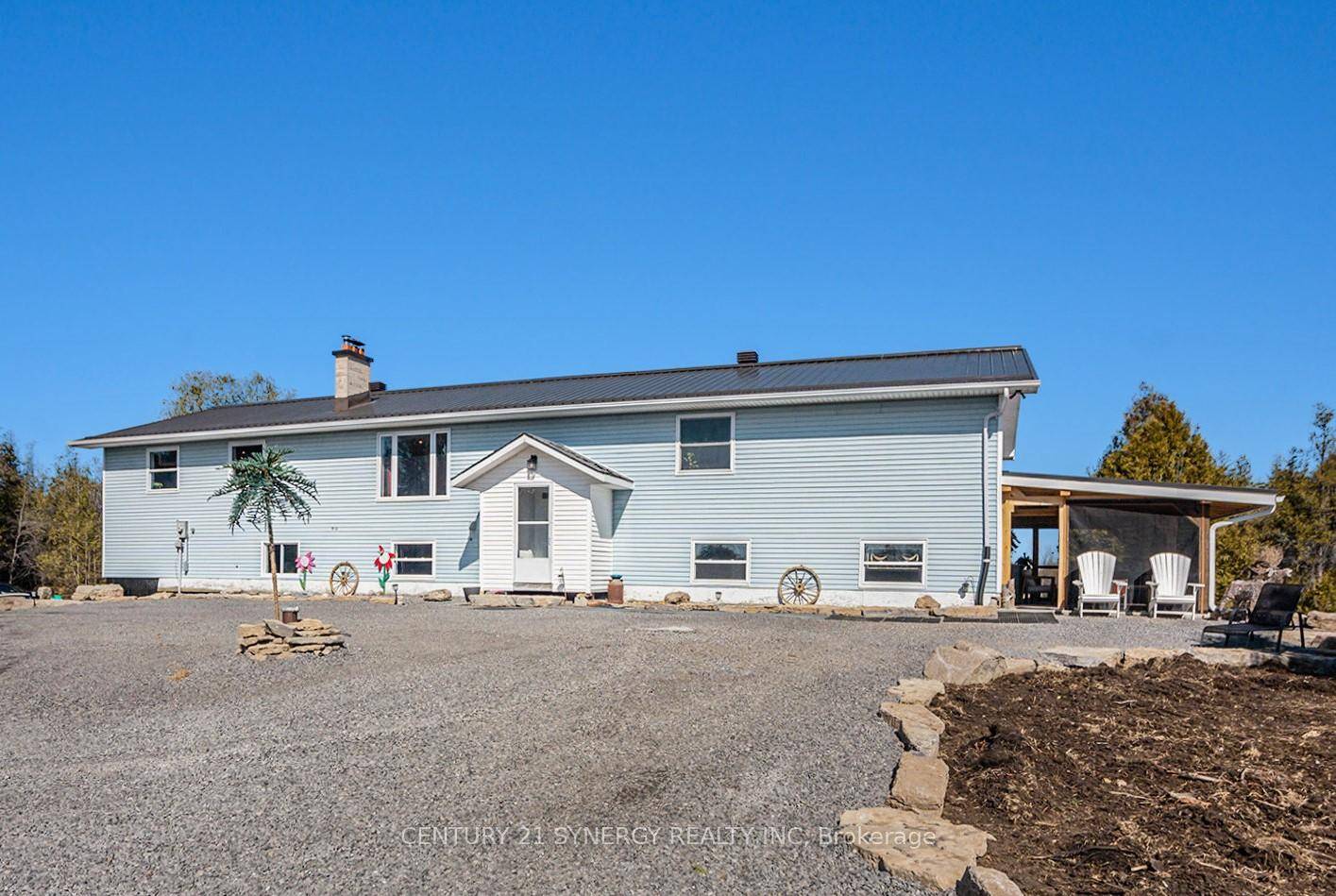 Welcome to this incredible country home nestled on over 26 acres of privacy and endless possibilities.
