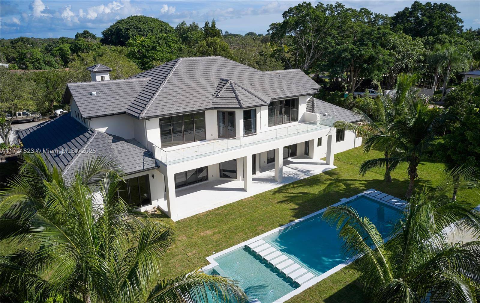 Welcome to your dream estate in the heart of Pinecrest, where luxury meets tranquility !