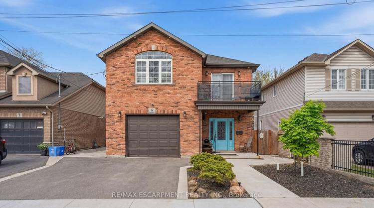 Tucked away on a quiet street, 5 Arden Ave offers the perfect blend of modern comfort and lakeside lifestyle.