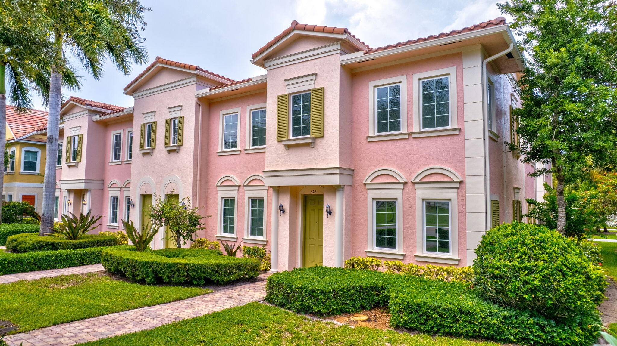 Welcome to the LARGEST TOWNHOME Model in Canterbury Place, minutes from downtown Abacoa and directly across from A schools.