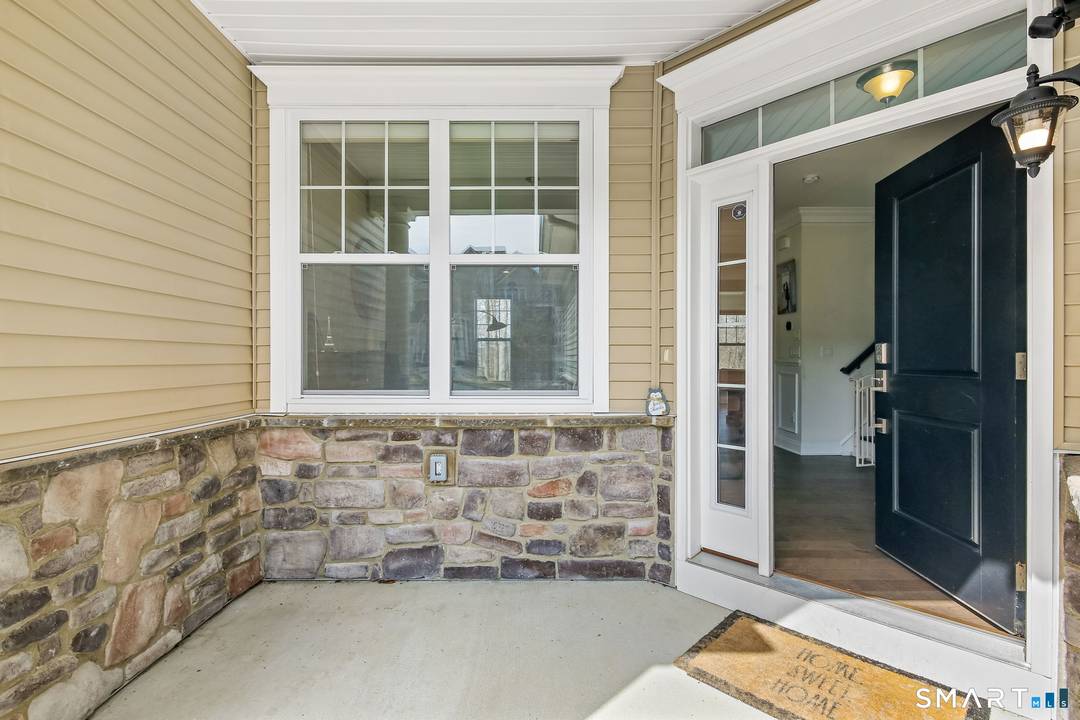 Experience the pinnacle of sophisticated living in this impeccably upgraded Portman model at The Ridge at Rivington.