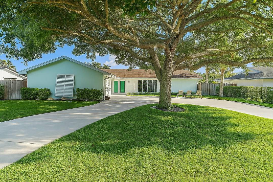 Completely renovated top to bottom with beautiful high end finishes POOL home located within the heart of Palm Beach Gardens with NO HOA !