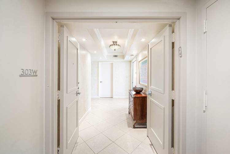 Experience the pinnacle of coastal elegance in this meticulously maintained oceanfront sanctuary.