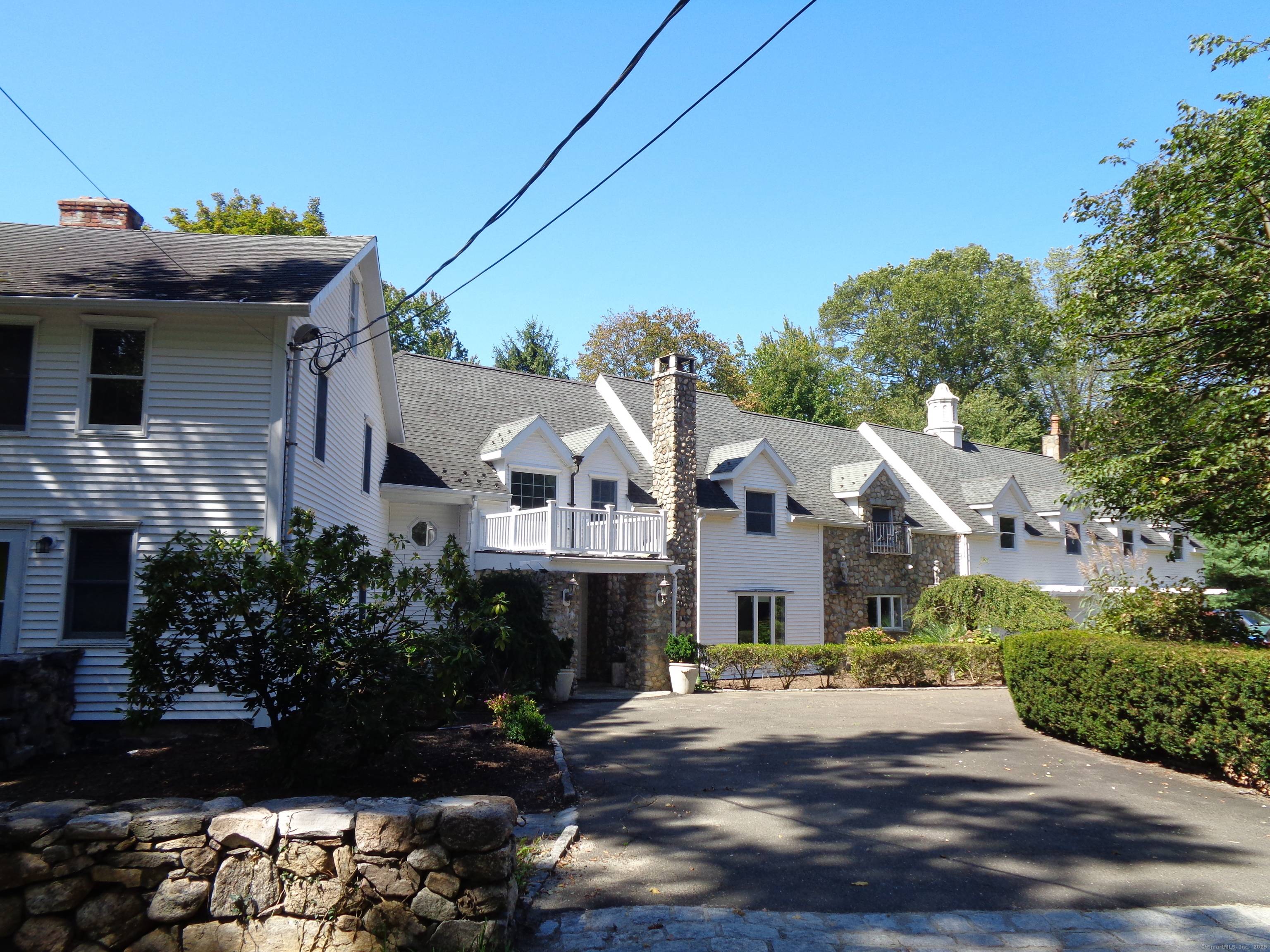 Welcome to this exceptional, generously sized home located in one of the area's most sought after towns, known for its top rated schools and vibrant community.