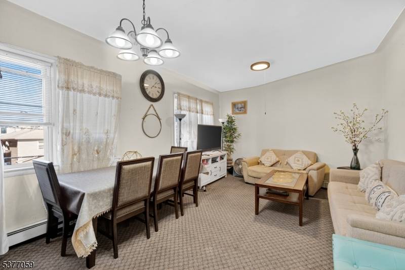 Welcome to this spacious two family home in the heart of Bayonne, offering a fantastic opportunity for both Owner occupants and investors.