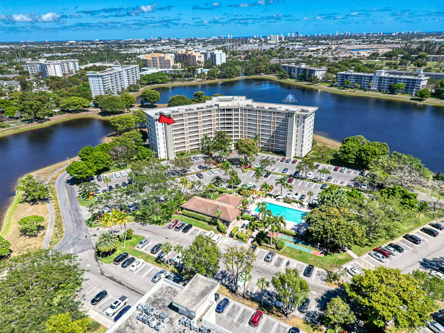 Welcome to this beautifully updated 2 bedroom, 2 bathroom condo offering sensational water views in the heart of the esteemed Palm Aire Country Club community.