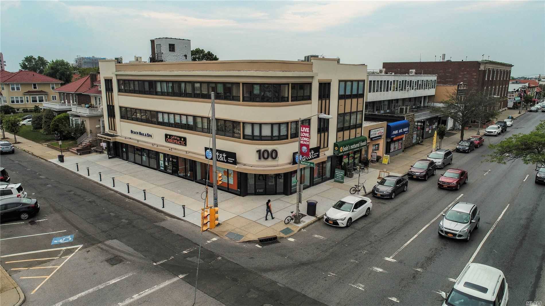 Prime office retail corner building across from City Hall and the LIRR.