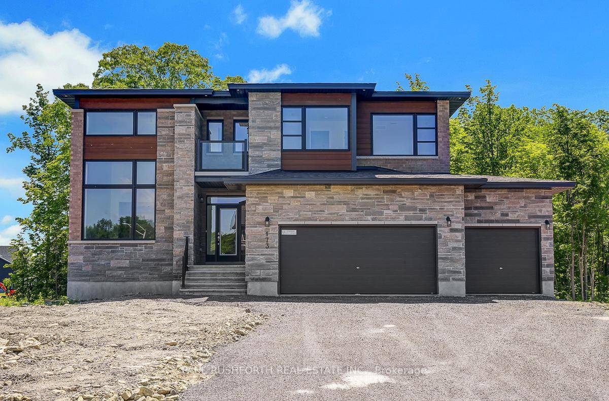 Absolutely Stunning, brand new, four bedroom, four bathroom home on a quiet corner lot with hardwood throughout, a walkout basement and a triple car garage.
