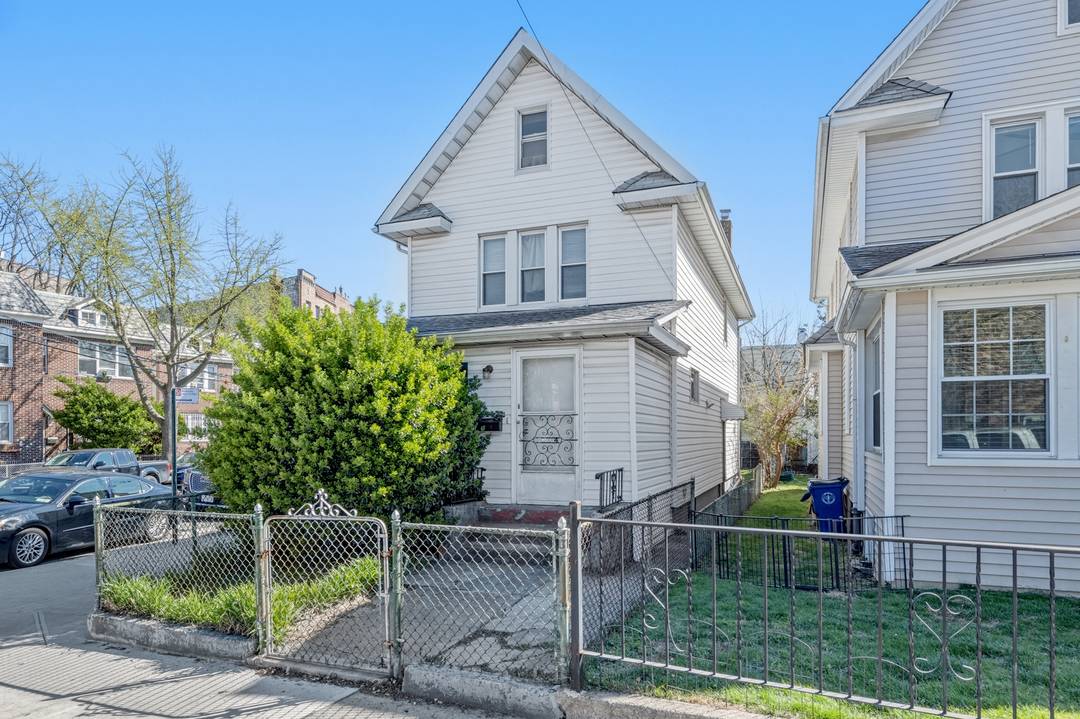 Set on a large corner lot in a peaceful part of Woodside, Queens, sits a charming three bedroom, two bathroom prewar home complete with a private one car garage and ...
