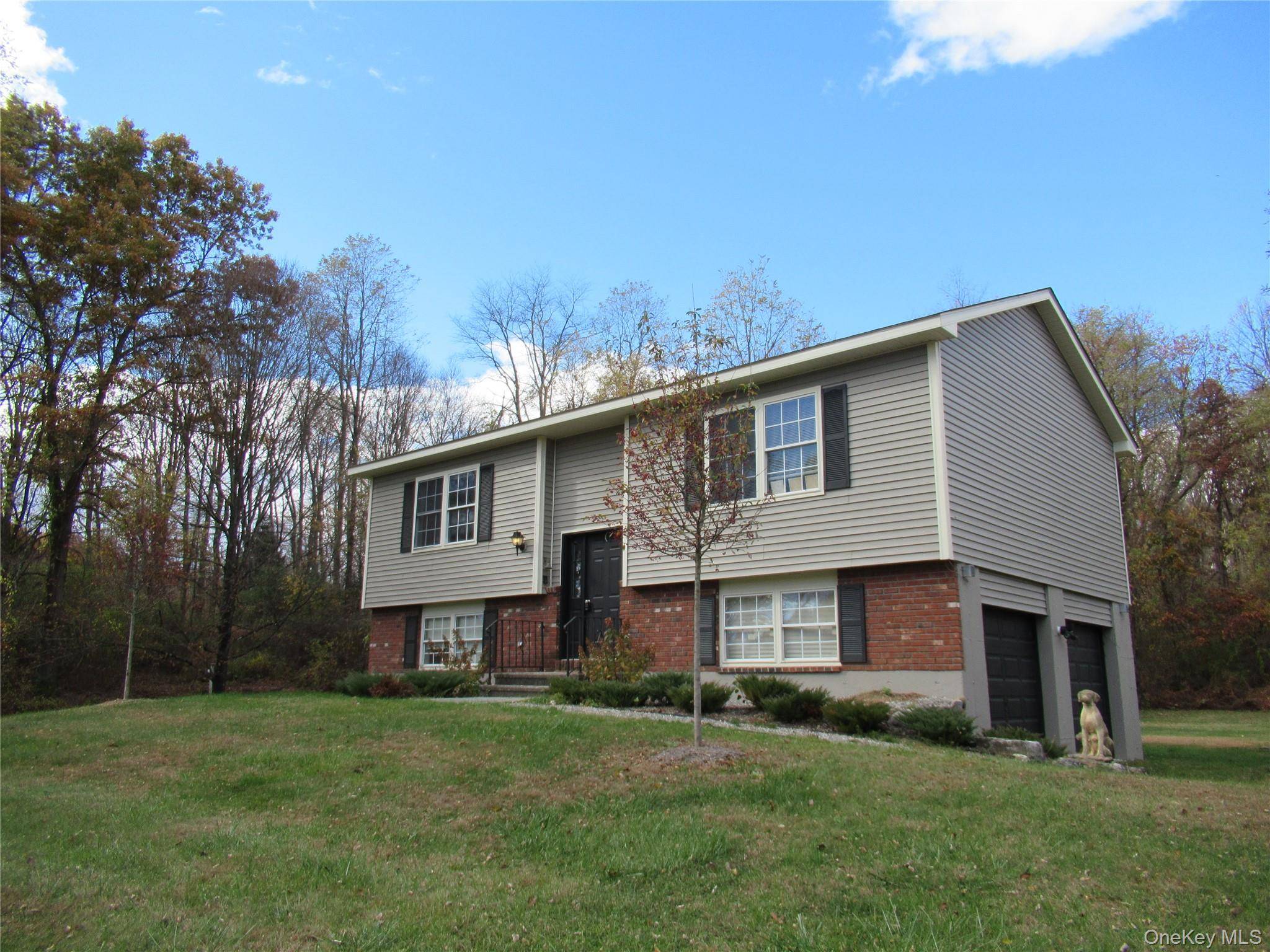 A secluded oasis come home to this 39 acre working horse farm without sacrificing convenience !