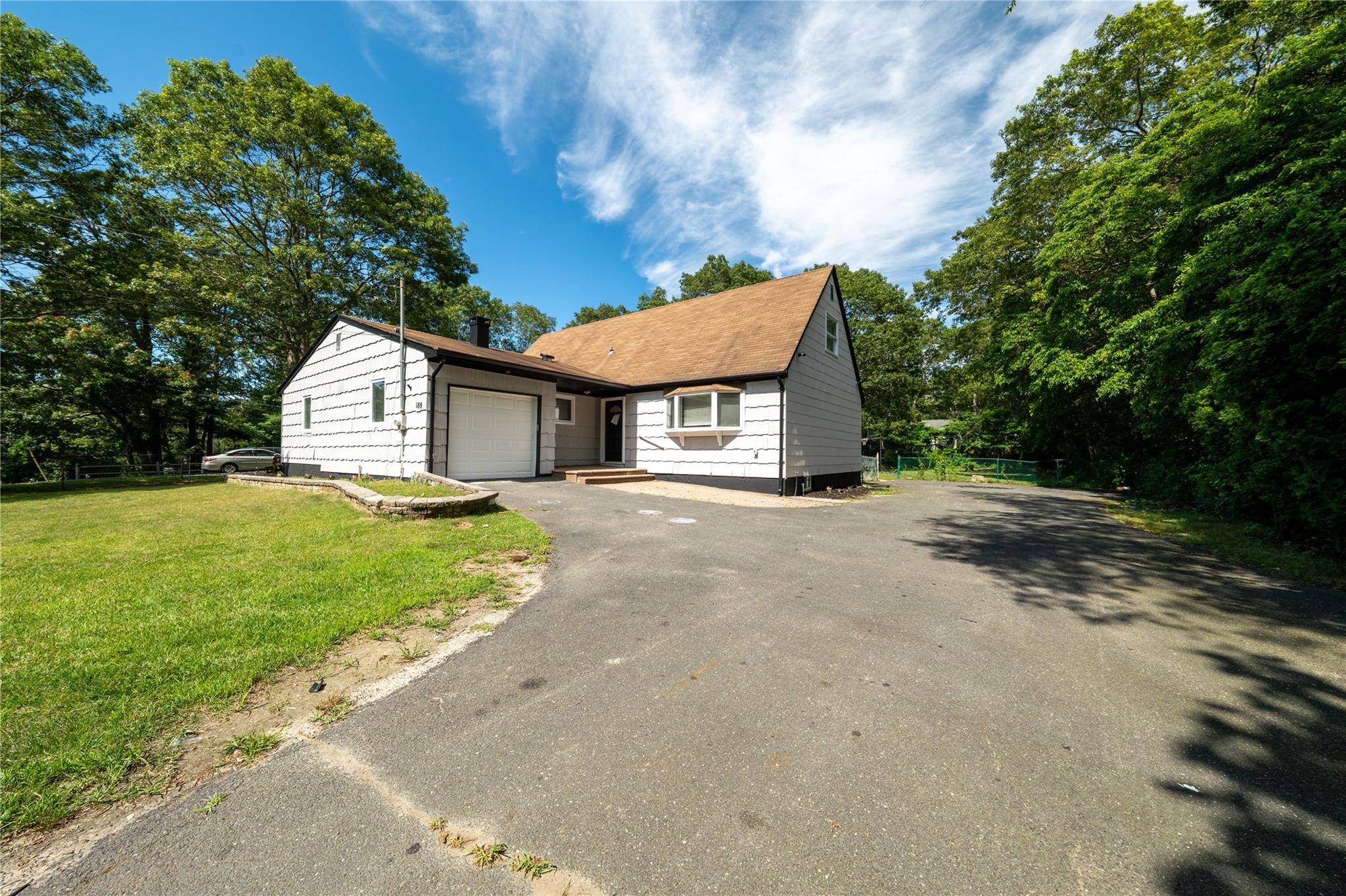 Welcome to 188 W End Ave a beautifully renovated and spacious home in the heart of Shirley.