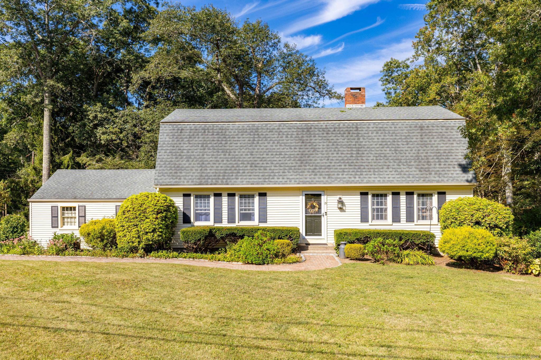 Introducing 19 Oakwood Drive, a charming Colonial set on a private 1.