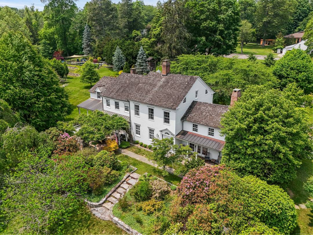 Welcome to The Benjamin Weed House an extraordinary 5 bed, 4 bath estate set on 3.