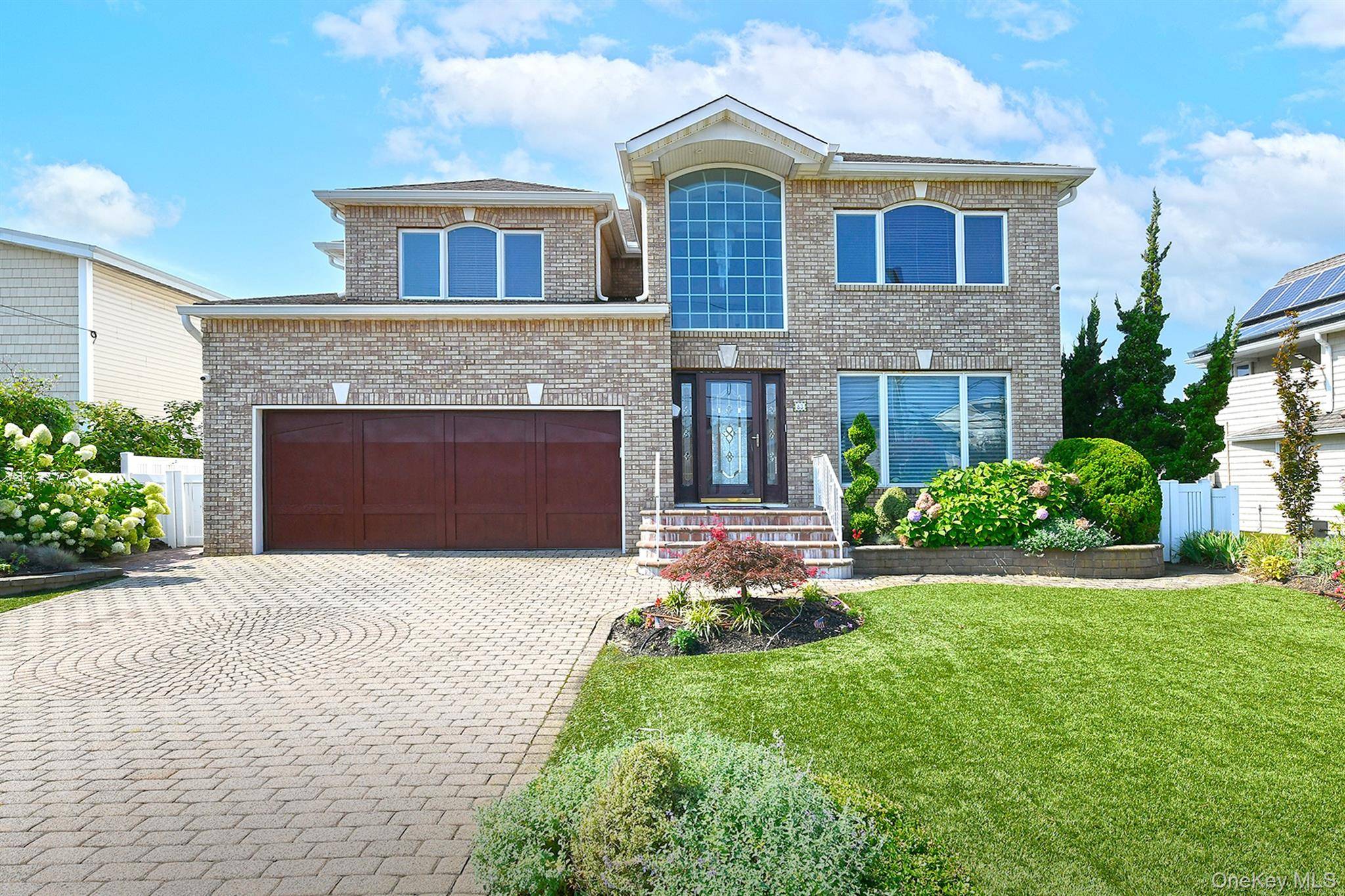 Welcome to 83 Fairwater, a young home with panoramic views of the Great South Bay, perfectly situated in desirable Nassau Shores.