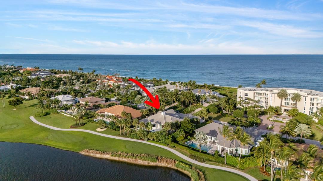 Set on one of the most coveted golf course lots in Sailfish Point, this refined two story residence offers sweeping lake and fairway views just steps from private beach access.