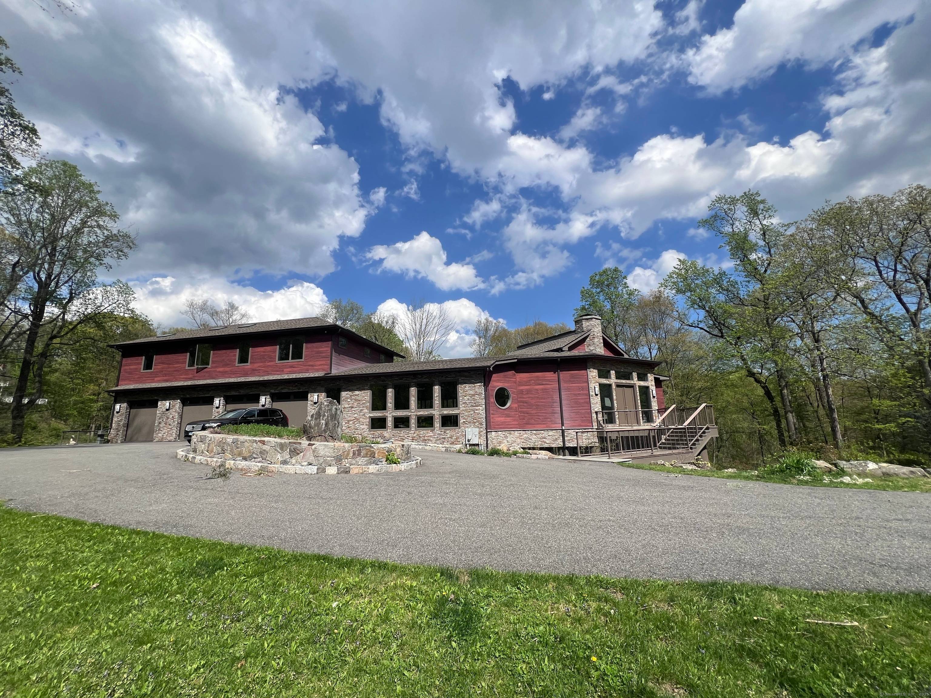 Mid Century Modern Inspired Turnkey Connecticut Contemporary influenced by the works of Frank Lloyd Wright and Philip Johnson Including spacious indoor outdoor living, more than 100 picture windows, skylights, and ...