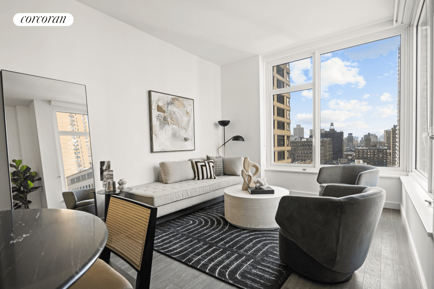 Welcome to Residence E, a corner unit two bedroom, one bathroom with a private terrace facing east, south, and west featuring remarkable city and Empire State views.