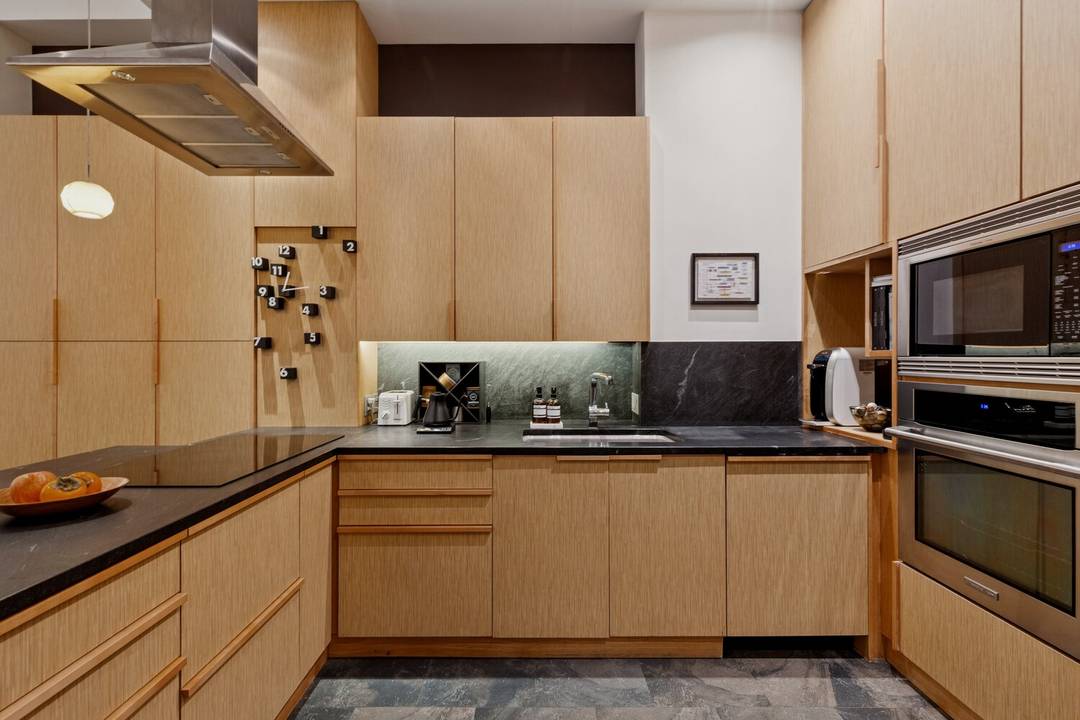 Live in a townhouse with comfort and security of a doorman in the historic Eagle Warehouse.