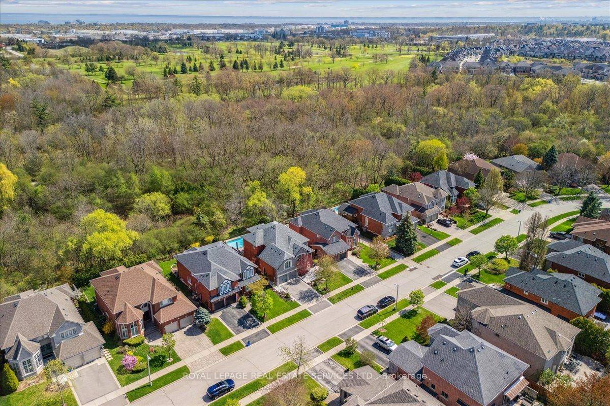 This exceptional 3, 646 above grade square foot Glen Abbey residence is perfectly positioned on a quiet, sought after street, backing onto the lush, dense ravine of the 14 Mile ...