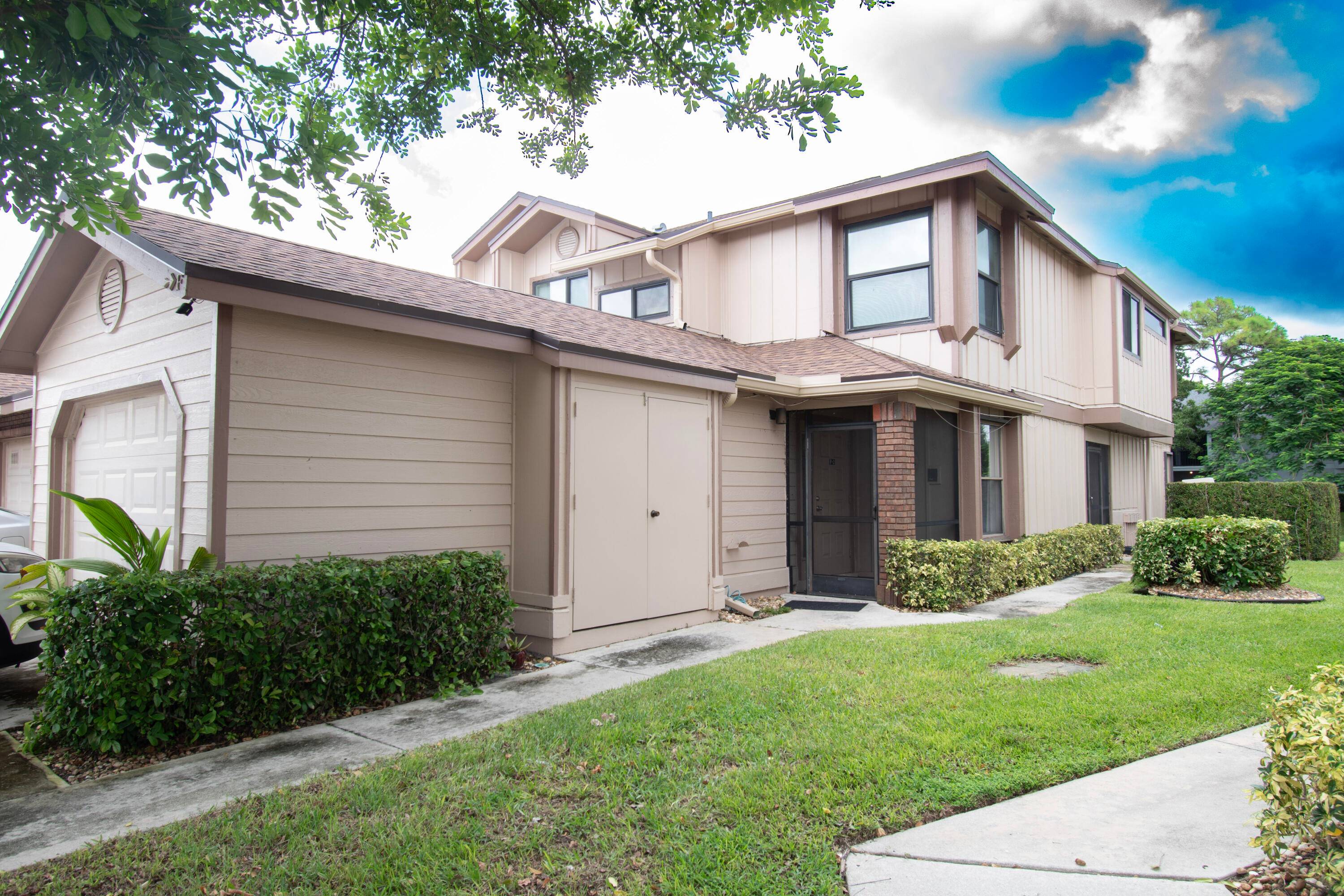 This 3 bedroom, 2 bath corner unit condo features 1, 298 sq.