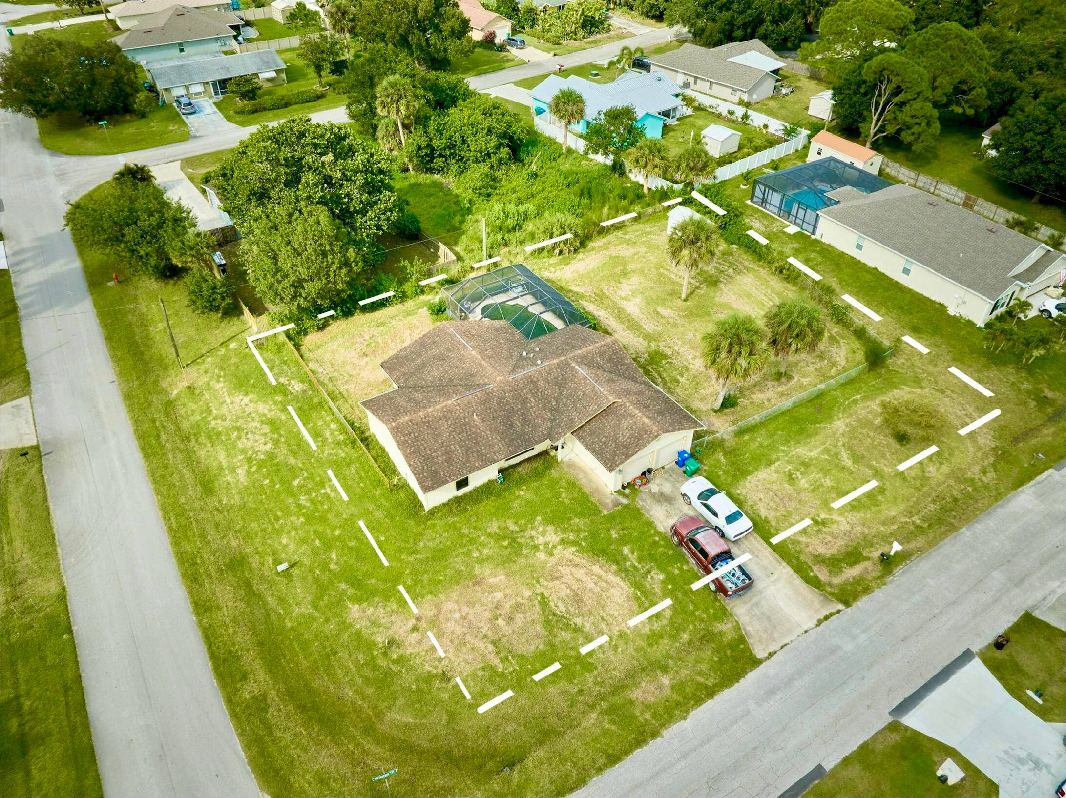 UNDER CONTRACT ! SEBASTIAN POOL HOME on a FENCED CORNER DOUBLE LOT.