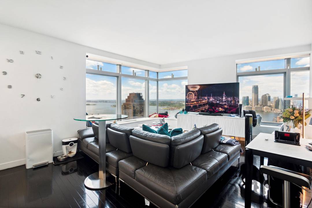 Views of 9 11 Memorial Park, Statue of Liberty, the river, city of Manhattan and beyond from every window of your residence.