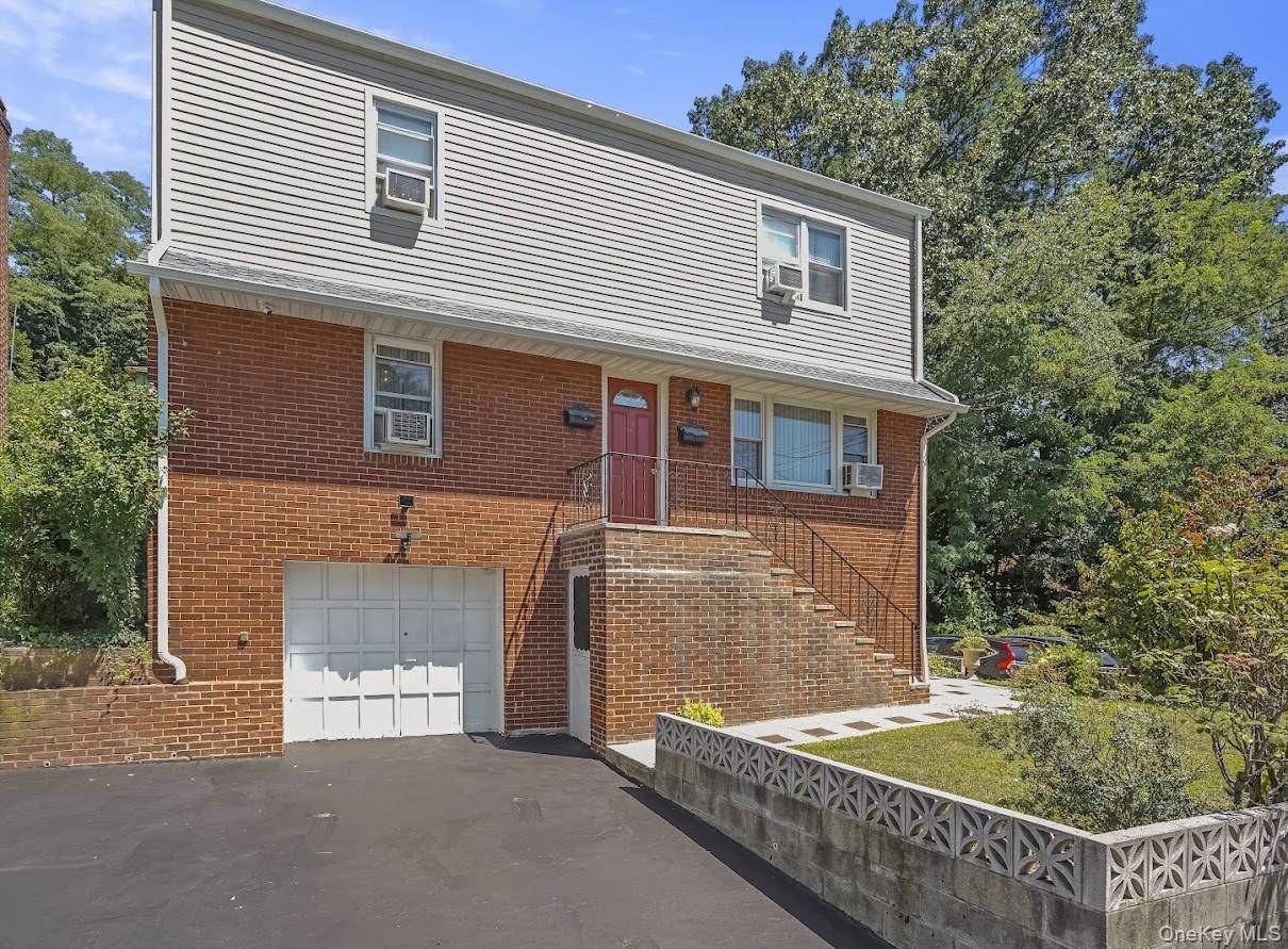 Well maintained brick front two family home, in ready move in condition showing it's owners pride.