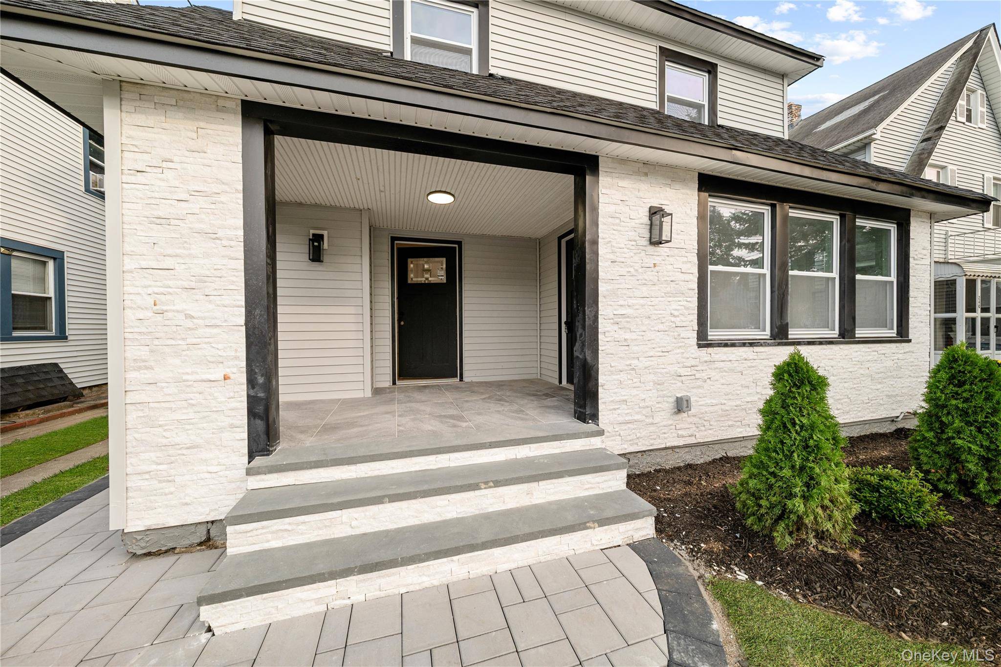 Beautiful renovated Colonial offering Modern open layout with designer finishes style, comfort, and convenience in one of Long Island s most sought after locations.