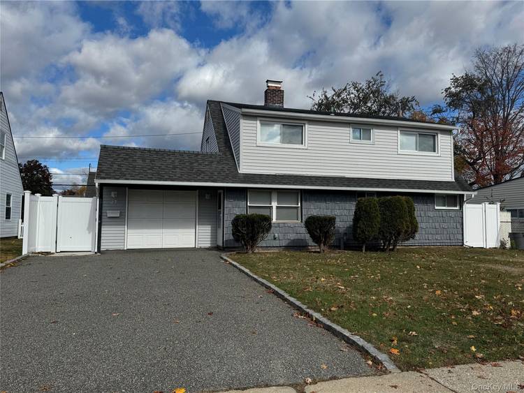 Beautifully updated Single Family House for Rent offering 4 bedrooms 2 Newly Updated Full Bathrooms, Eat In Kitchen, Living Room with Fireplace, Den Office.