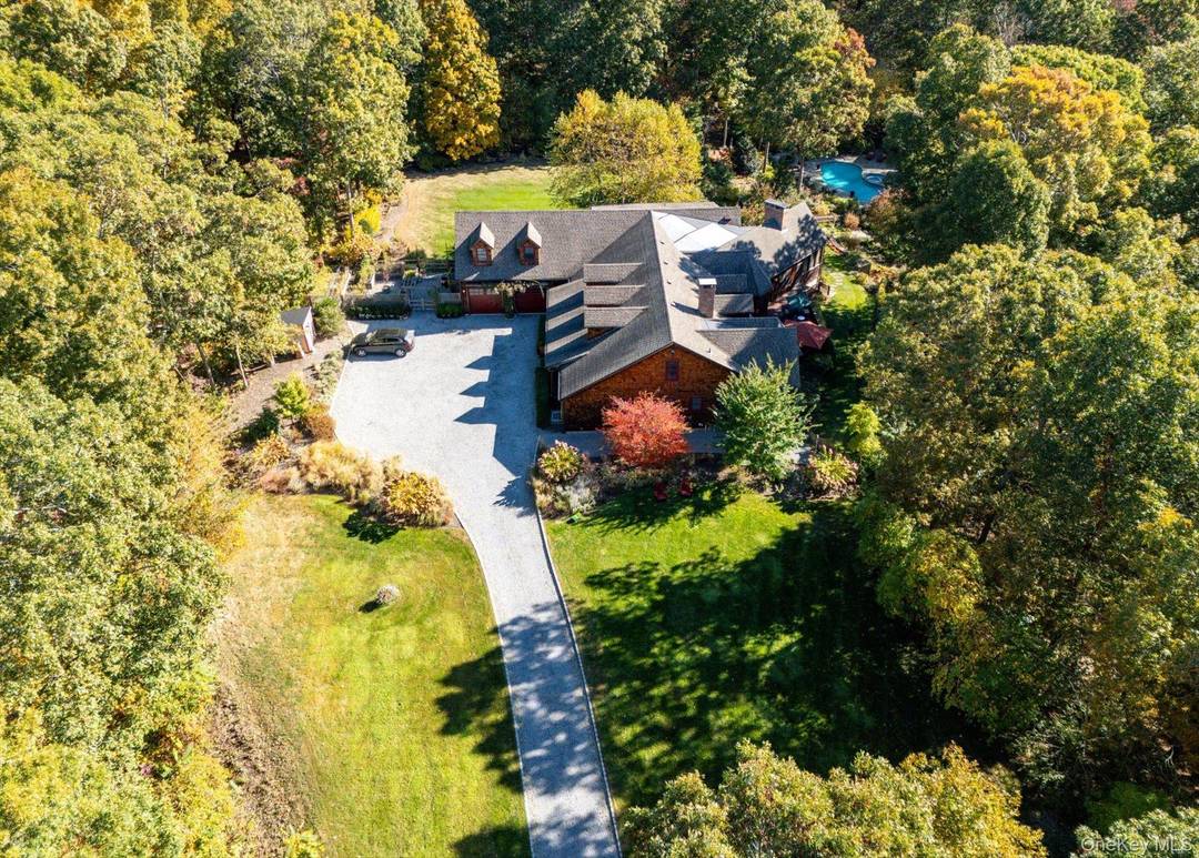 Secluded, Luxury Style Estate amp ; Compound with Resort Style Living In Serene Natural Setting Set on nearly 5 private acres surrounded by the 400 acre Laurel Lake Preserve and ...