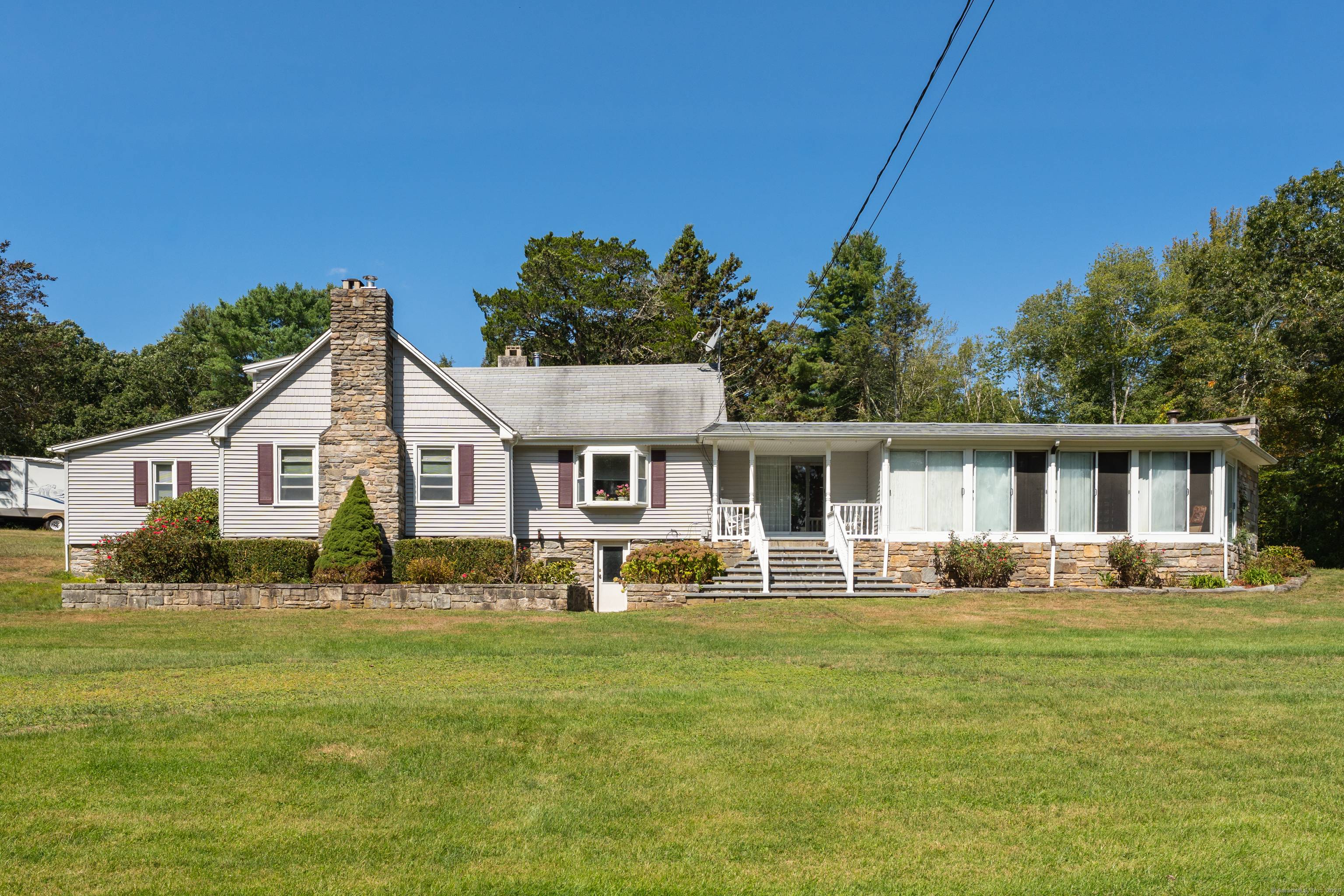 Privacy abounds in this distinctive, unique, 3 bedroom, 1.