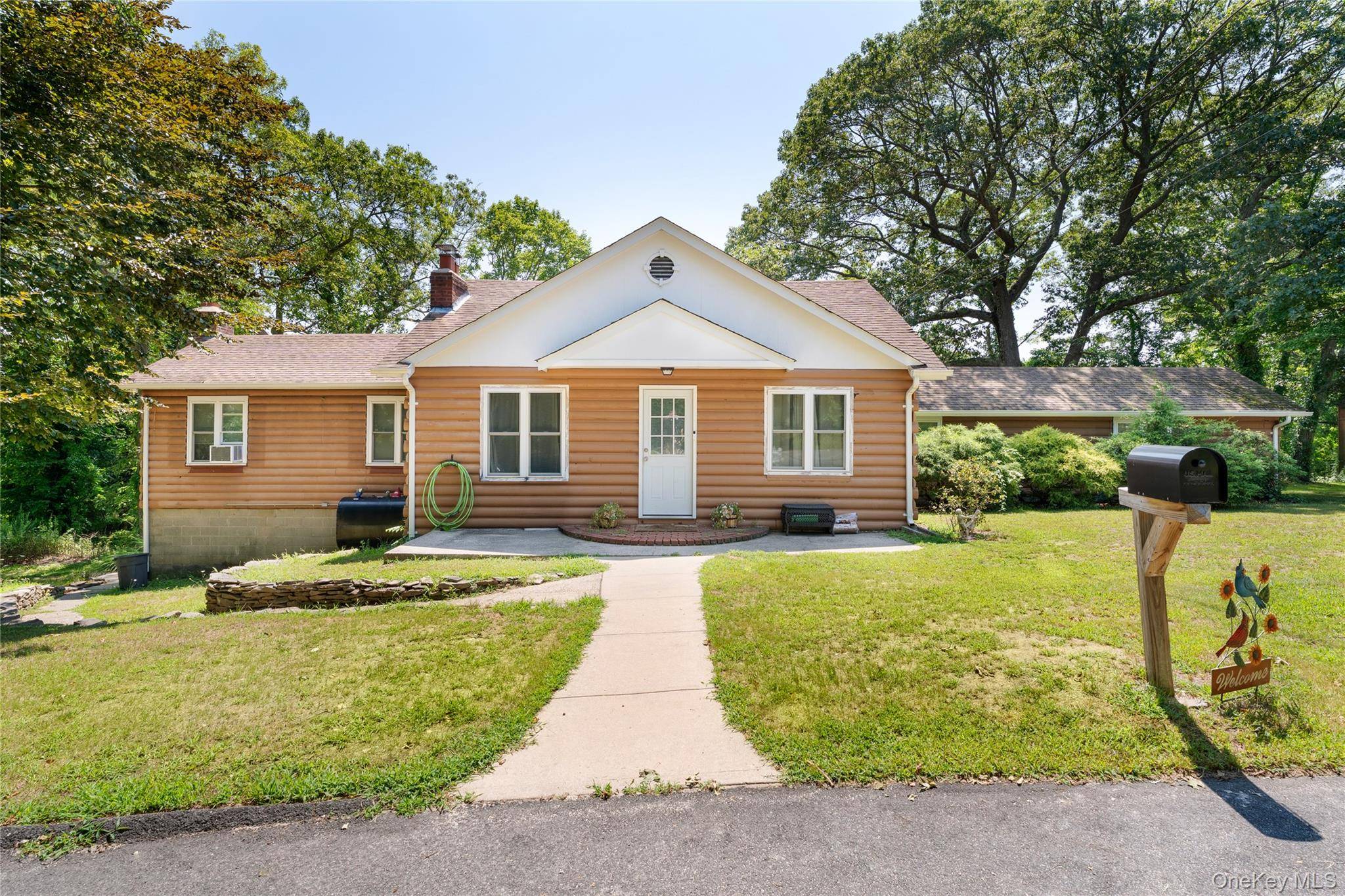 Single family dwelling with an accessory apartment, comprising an upstairs unit with three bedrooms and one bath and ground floor with one bedroom and one bath.