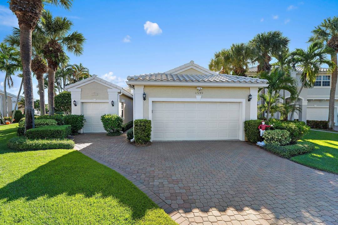 Charming single story waterfront home with full hurricane protection, a full house generator and sweeping water views.