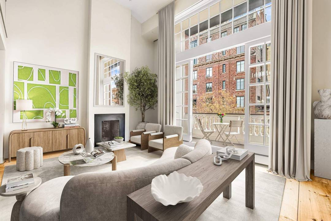 This extraordinary mint condition triplex penthouse at 52 West 9th Street is a light filled, architecturally significant residence on one of Greenwich Village s most distinguished blocks.