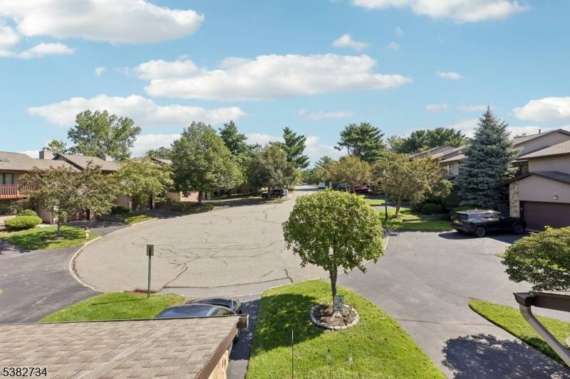 2 bedroom, 2 full and 1 half bath Aspen unit with 1 car garage and full, finished lower level with sliders to a patio offers 2, 000 sq.