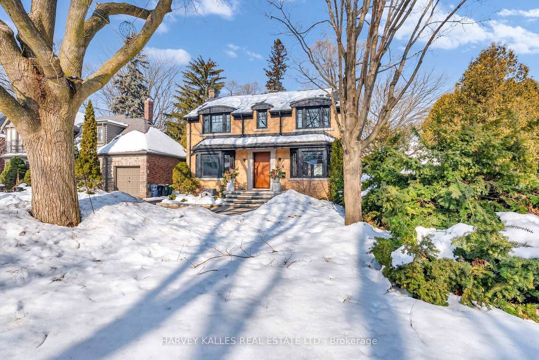 Architecturally striking and filled with natural light, this custom designed home showcases exceptional craftsmanship and warm wood detailing throughout.