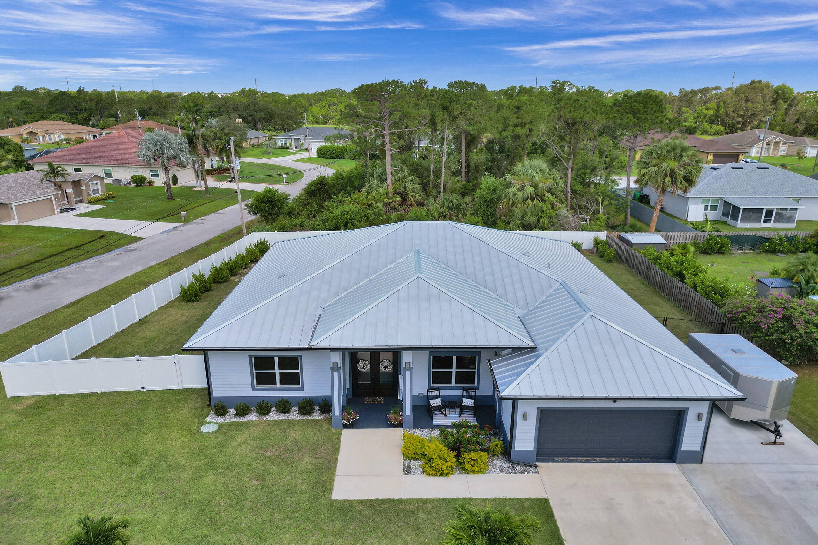 This stunning newer construction 4 bedroom, 3 bathroom pool home sits on a premium oversized corner lot with no HOA fees or restrictions, offering the ultimate in versatility and luxury ...