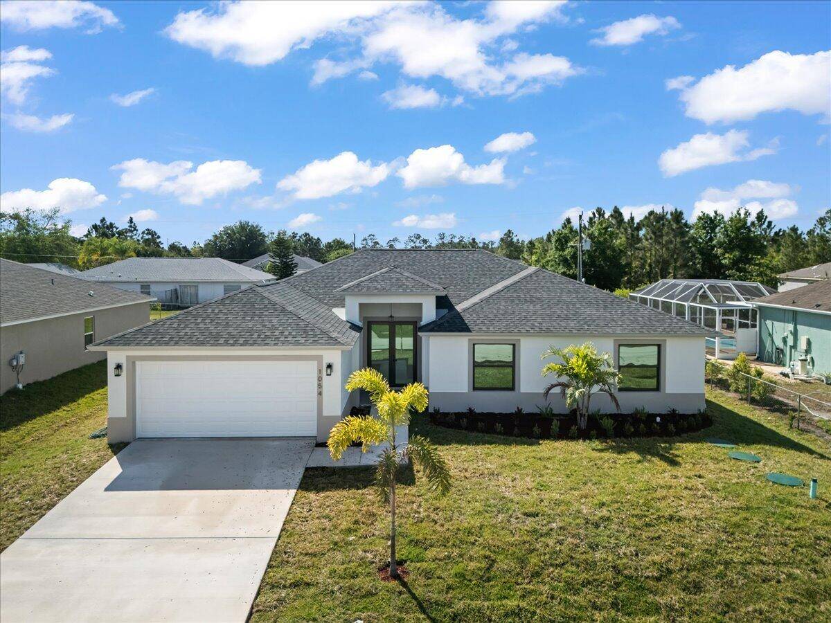 MOVE IN READY ! NO HOA 4 3 with significantly higher end finishes and features than the average new builds in Palm Bay.