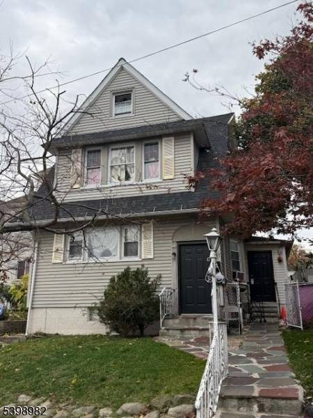 Two family home located in the center of town, close to downtown shops, schools and transportation.