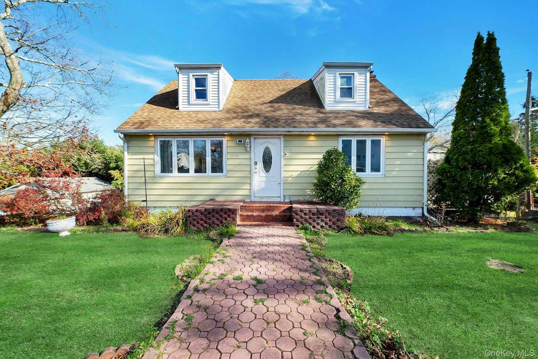 Welcome to this Expanded Cape style residence.